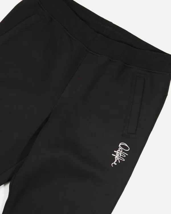 Черные джоггеры OUT FO FAME BASE BLACK спереди, свободные спортивные брюки с эластичным поясом