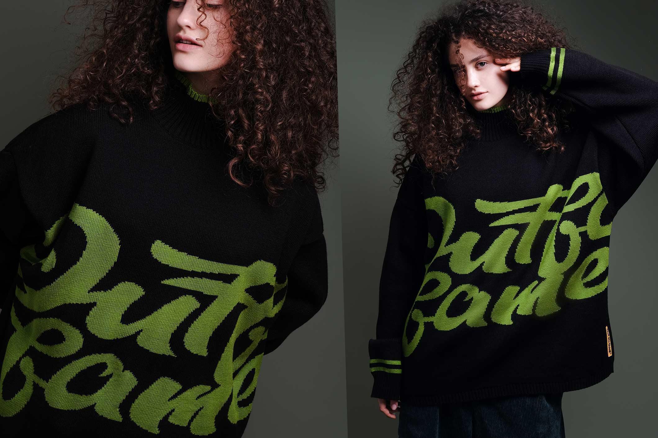 Черно-зеленый теплый свитер с логотипом OUT FO FAME